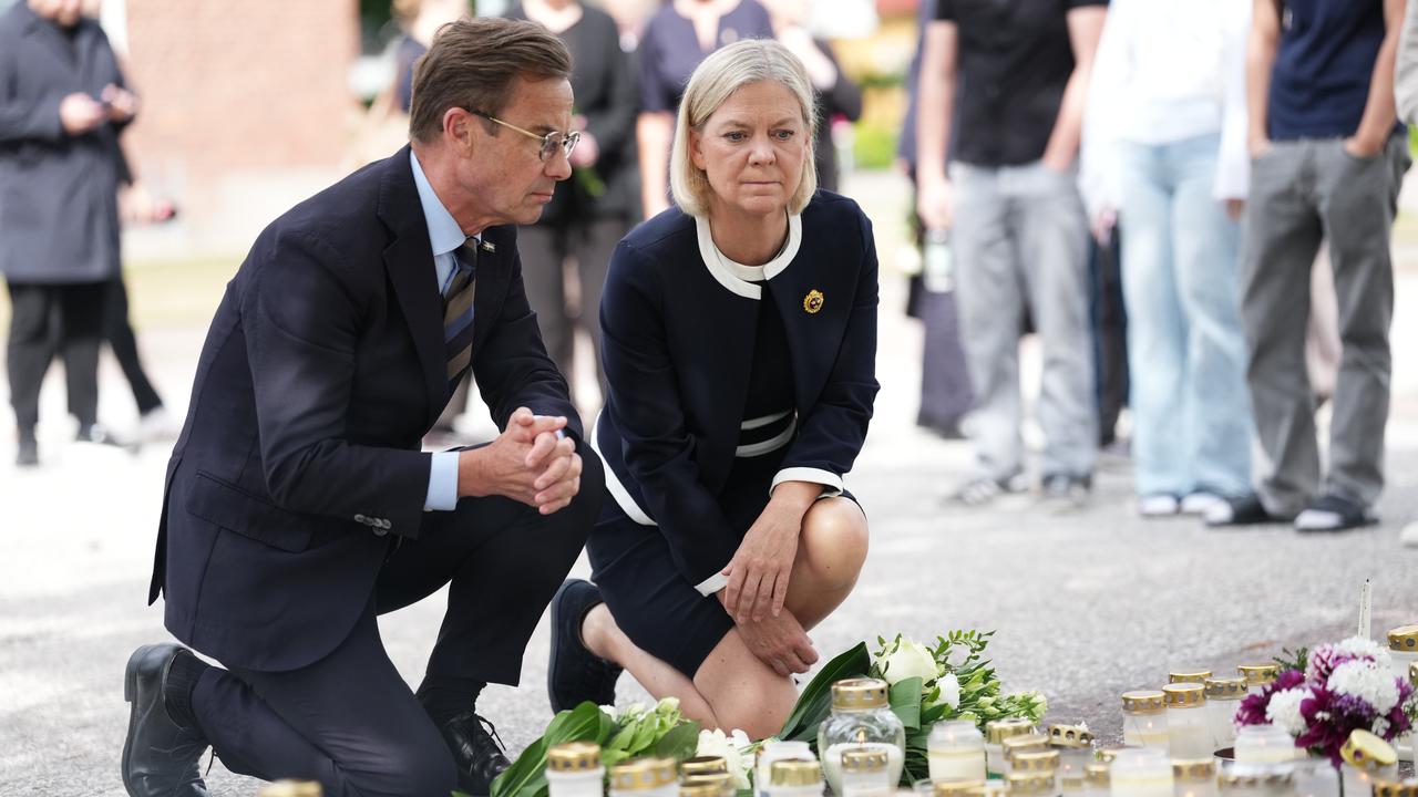 Ulf Kristersson and Magdalena Andersson at a school attack memorial