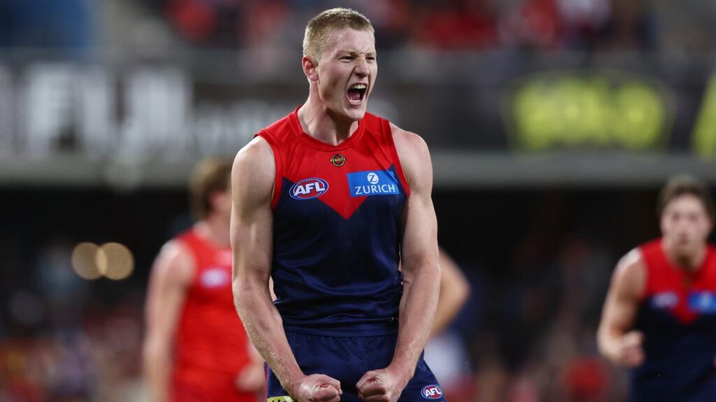 Melbourne have beaten Gold Coast by nine points, with Jacob van Rooyen kicking three goals.
