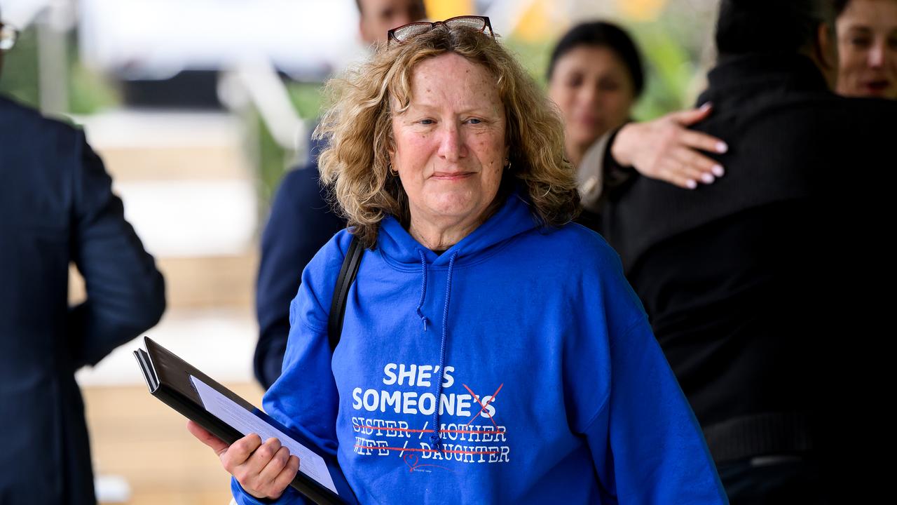 Jacky Finlay-Jones enters inquest with slogan on jumper