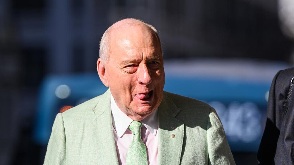 An athlete accusing Alan Jones of indecent assault has adjusted his account during cross-examination
