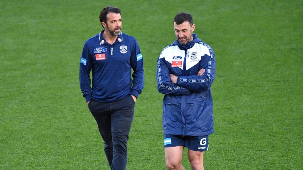 Nigel Lappin (r), seen with Geelong coach Chris Scott, will be Tasmania’s first head of development.
