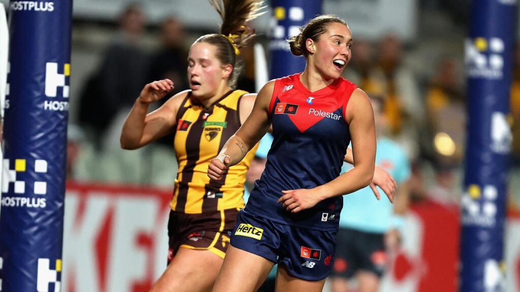 In her first game for Melbourne, Mia Austin kicked four goals as they beat Hawthorn by 19 points.
