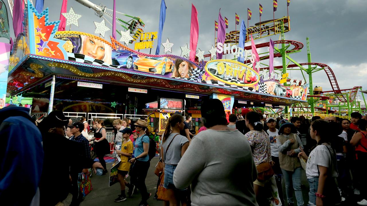 A crowd is seen at a sideshow alley (file image)