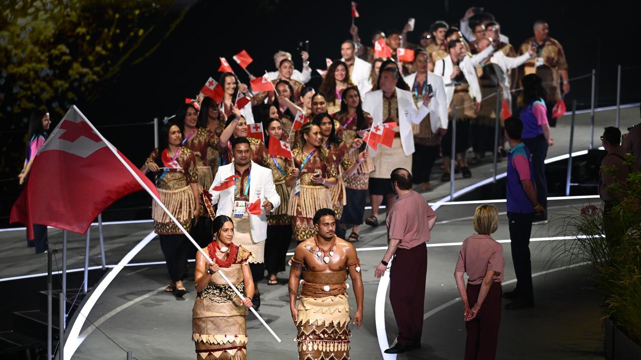 Tonga enters the stadium
