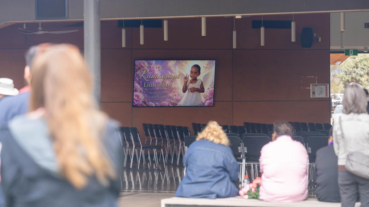 Mourners at the funeral for five-year-old Kumanjayi Little Baby