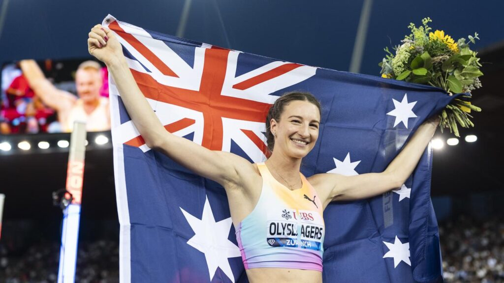Nicola Olyslagers proudly displays the Australian flag after her Zurich Weltklasse high jump win.
