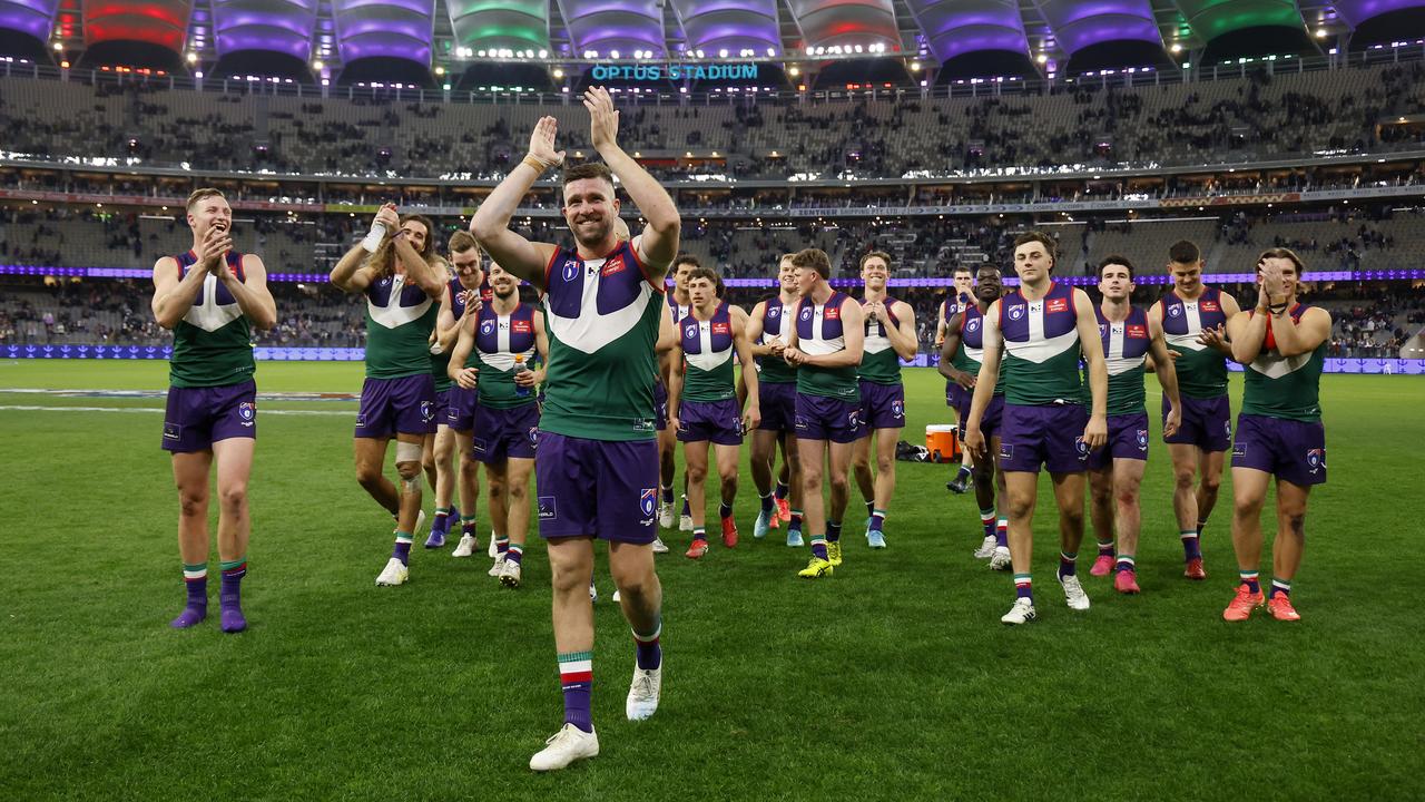 Fremantle walk off Optus stadium.