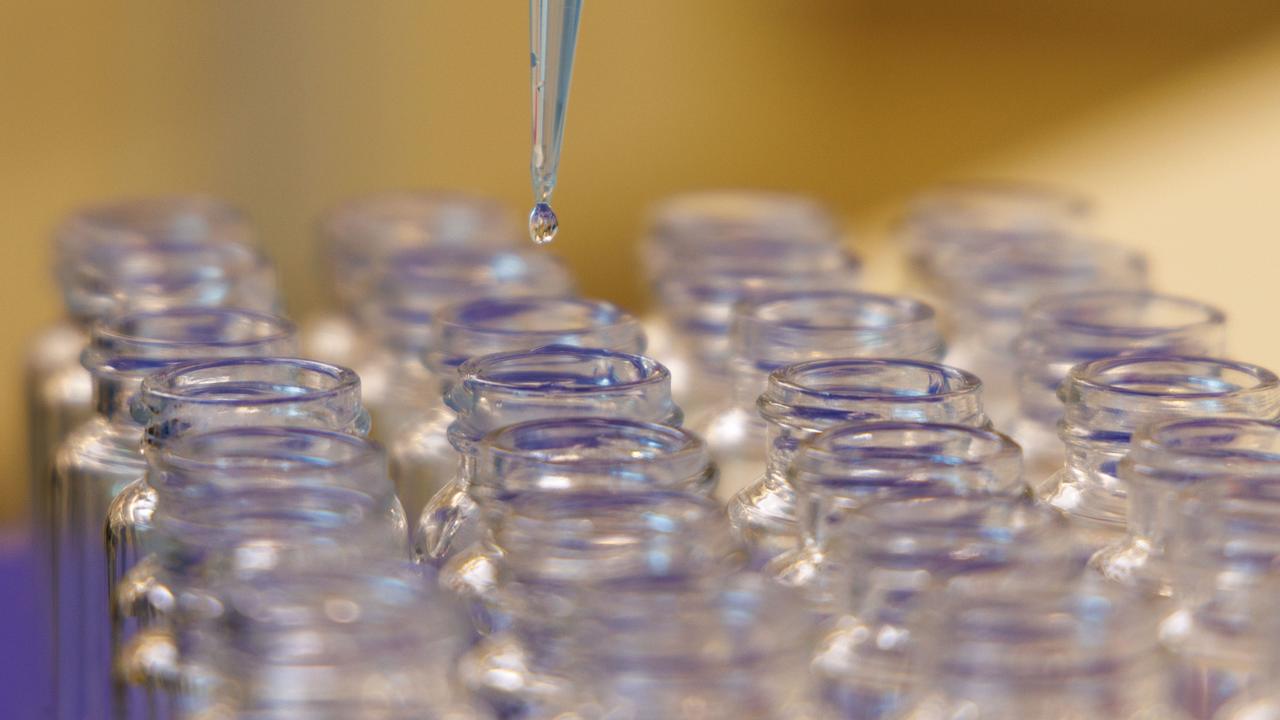 Pipette depositing samples into test tubes (file image)