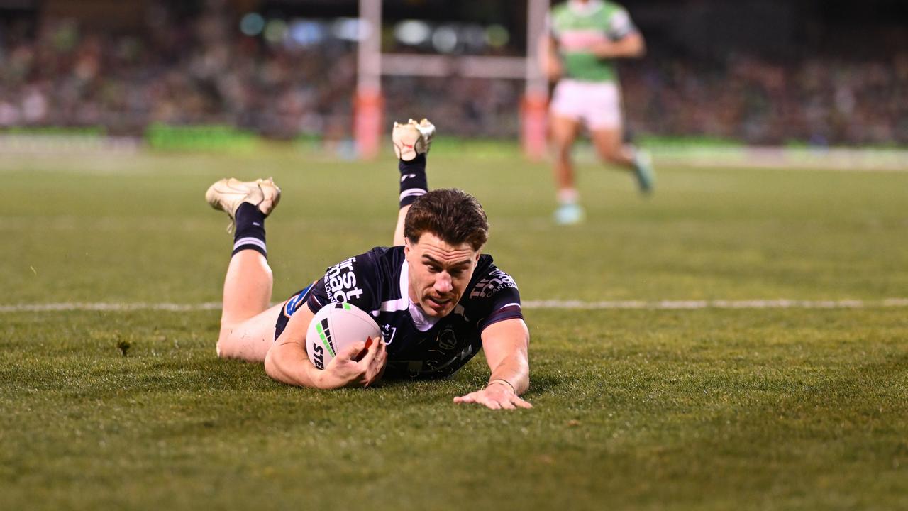 Grant Anderson of the Broncos scores a try