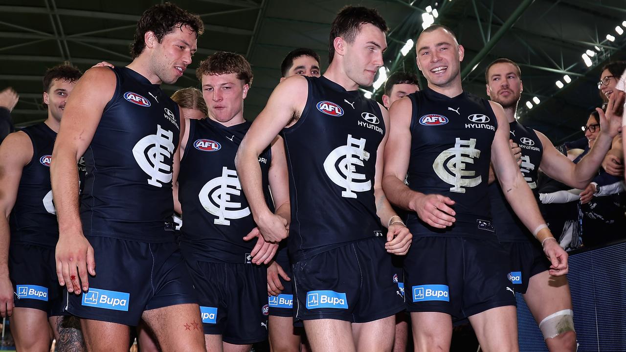 Carlton Blues players celebrate.