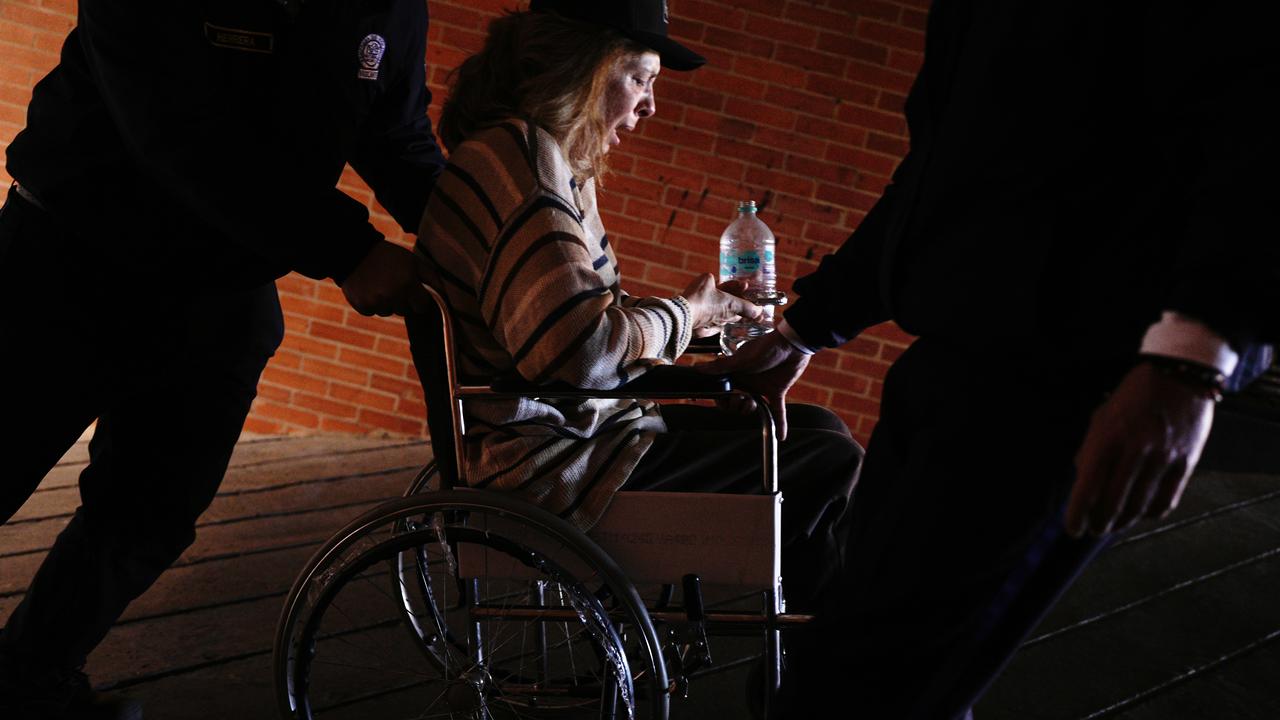 A wheelchair user evacuates