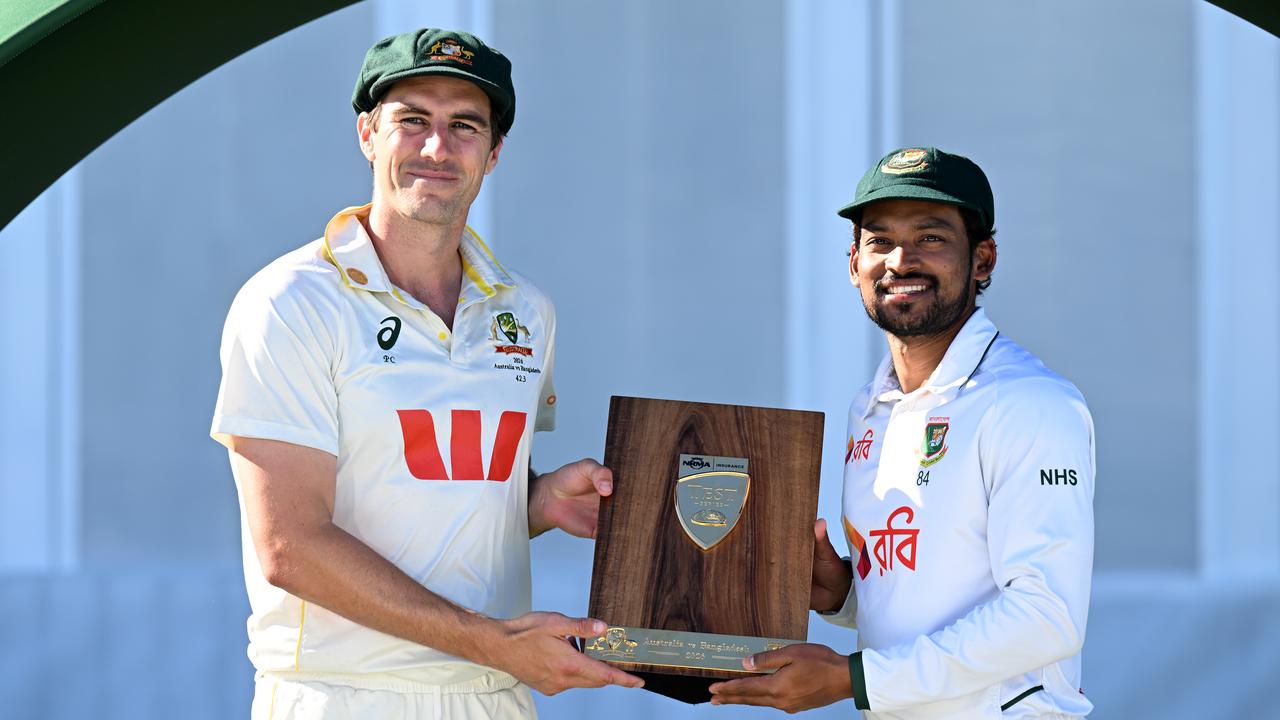 Pat Cummins and Najmul Hossain Shanto.