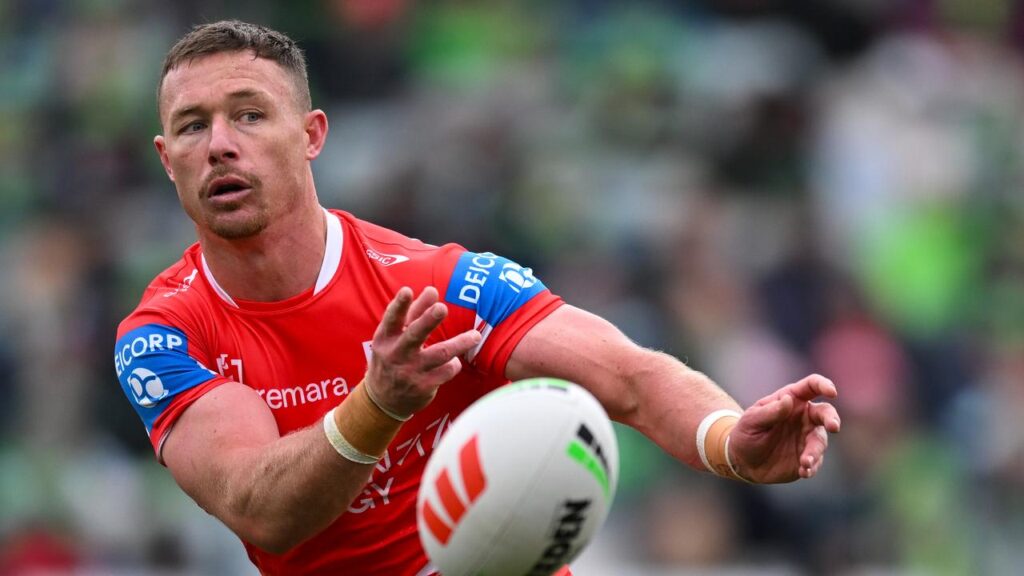 Damien Cook insists he is still heading to the UK, despite the coach who signed him moving on.
