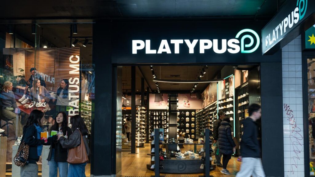 The owner of the Platypus shoe brand says consumer confidence dropped in the June quarter.
