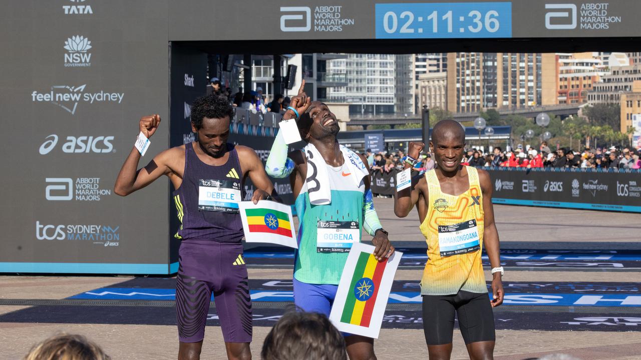 L-R Silver medalist Chimdessa Debele