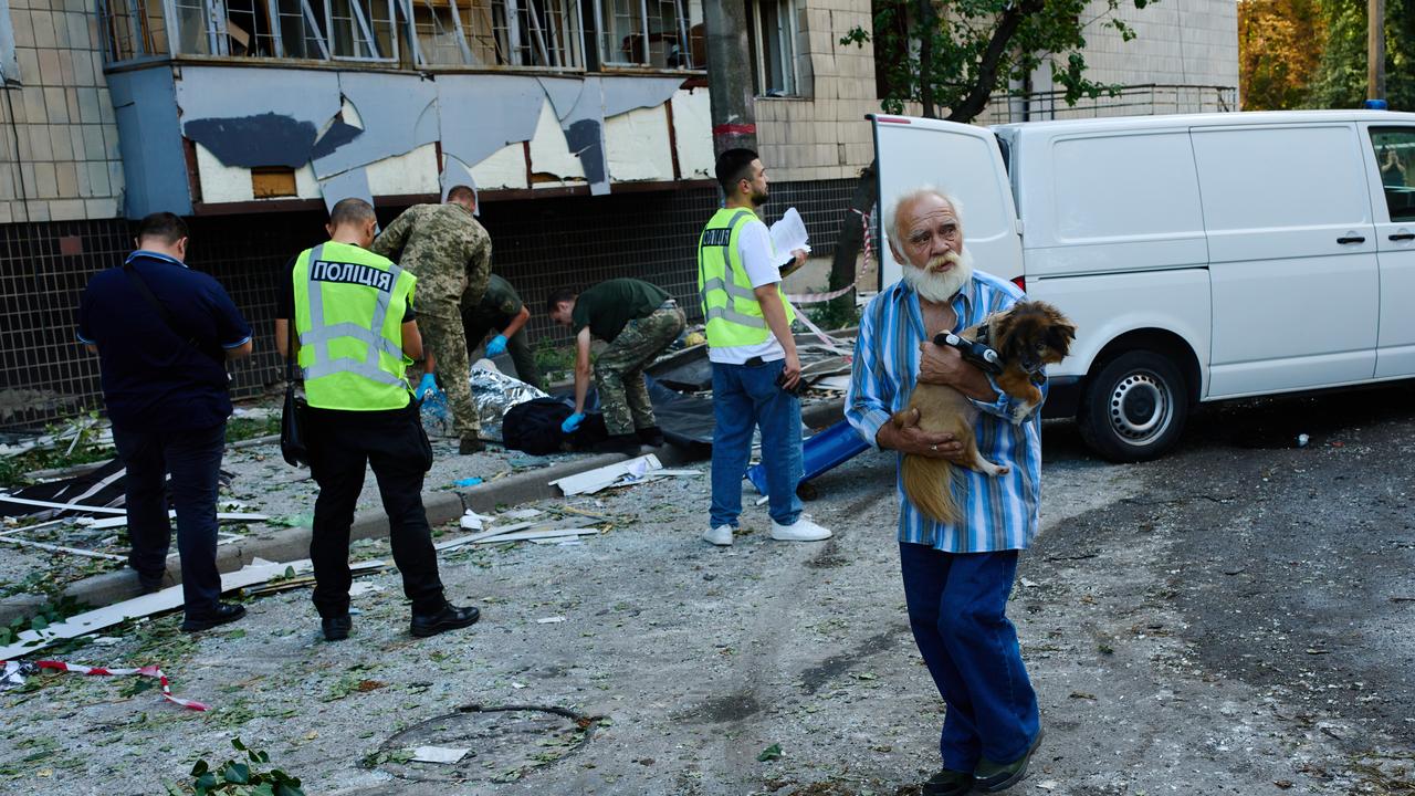 People after an overnight Russian attack in Kyiv, Ukraine