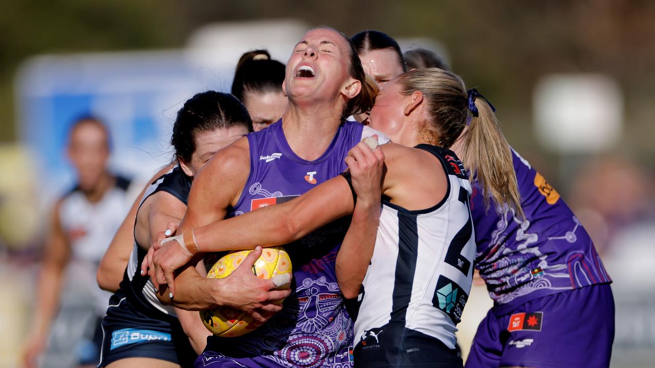 Keeley Sherar tackles Gabby Newton.