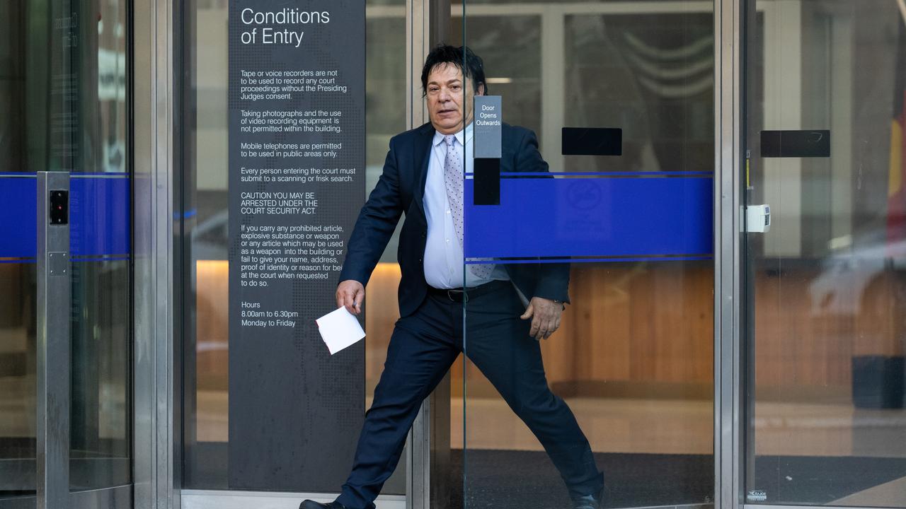 Ralph Carr leaves court