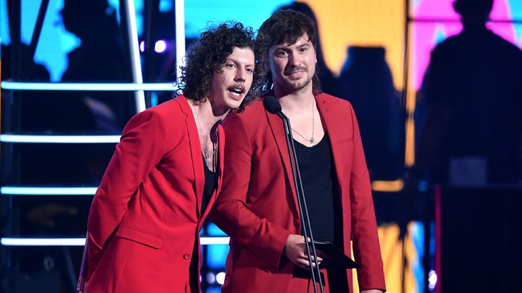 Peking Duk’s Adam Hyde (left) has backed the move to ban AI-generated music from the ARIA charts.
