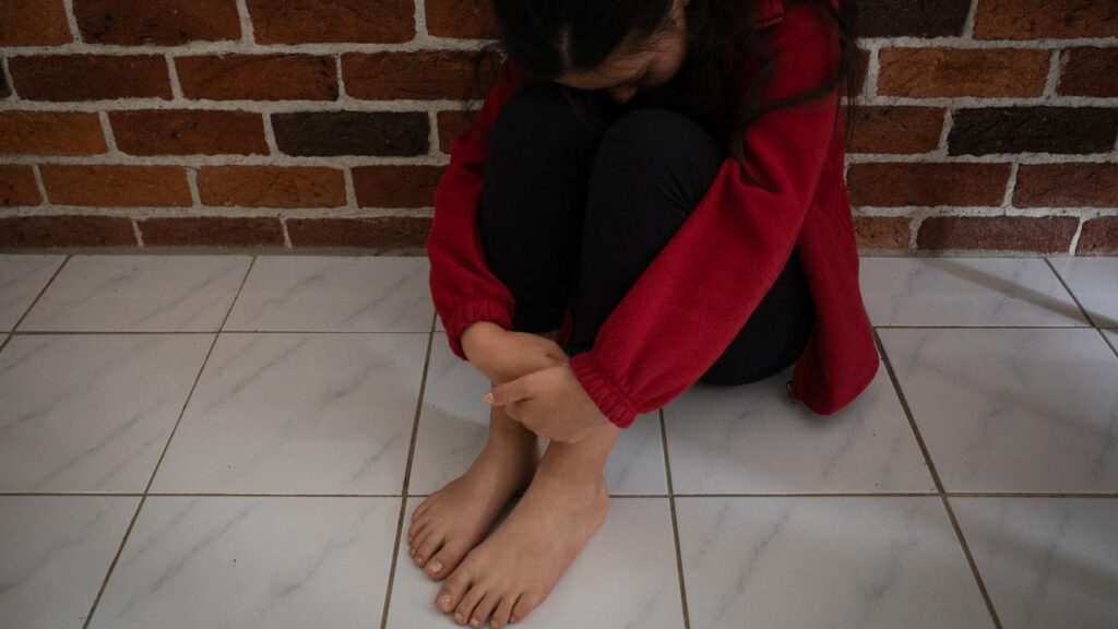 A state-funded residential care home staff member is accused of assaulting a teenage girl.
