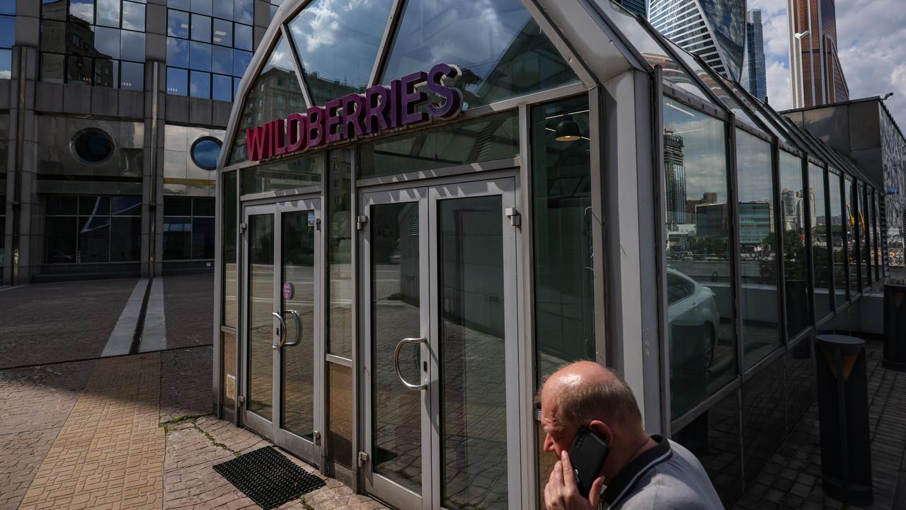 A man walks past a Wildberries pickup point in Moscow