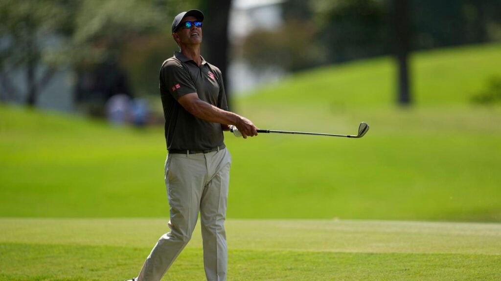 Adam Scott follows his ball during his four-under 66 in the first round of the St Jude Championship.
