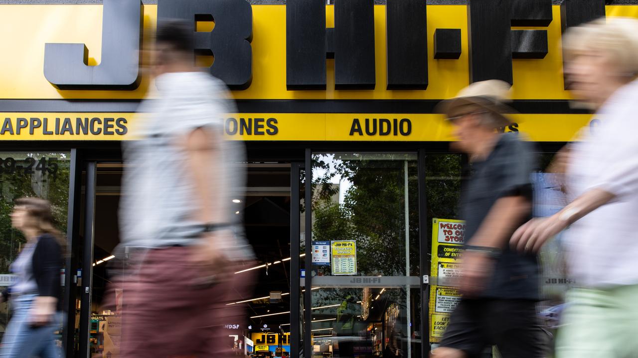 People walk past a JB Hi-Fi store (file image)