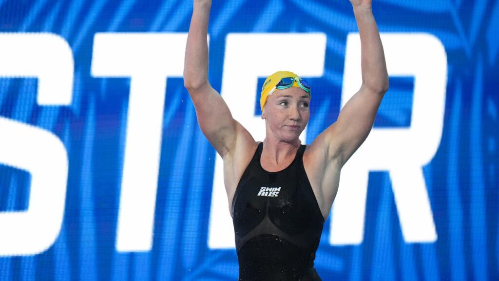 Lani Pallister salutes after winning the women’s 200m freestyle at the Pan Pacific championships.
