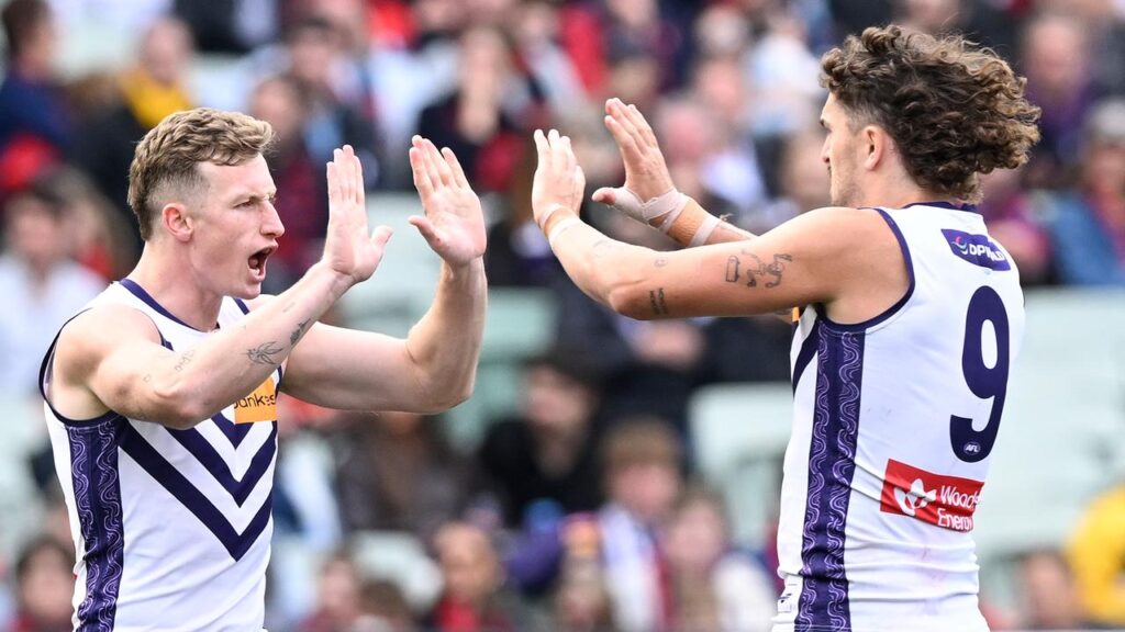 Josh Treacy (left) celebrates a goal with Luke Jackson, with both earning All-Australian honours

