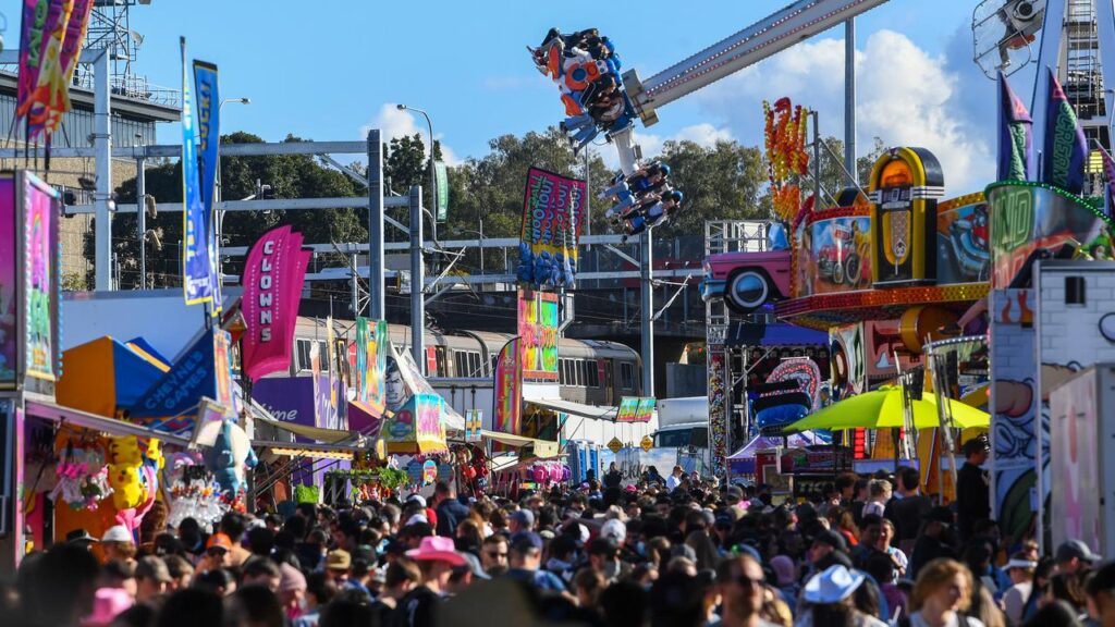 A One Nation staffer was allegedly set upon by four people at the Royal Queensland Show.
