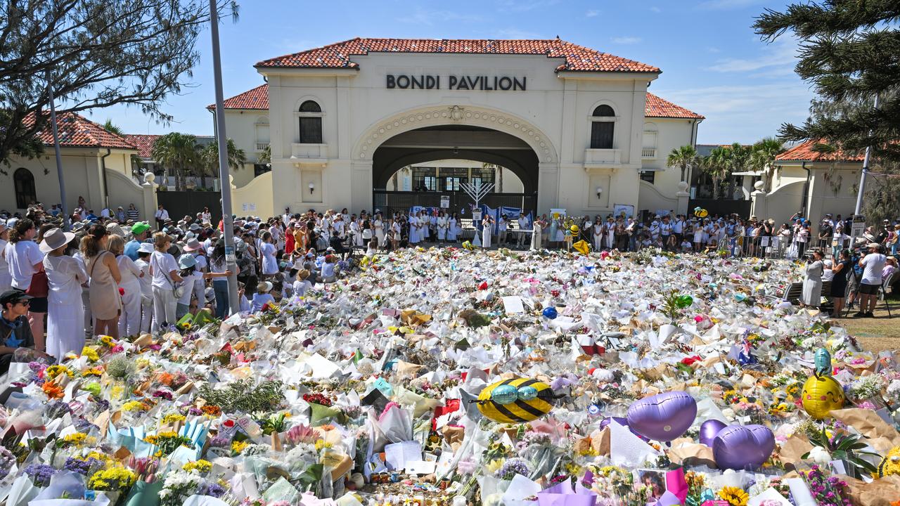 Mourners and flowers at the Bondi Pavillion in Sydney