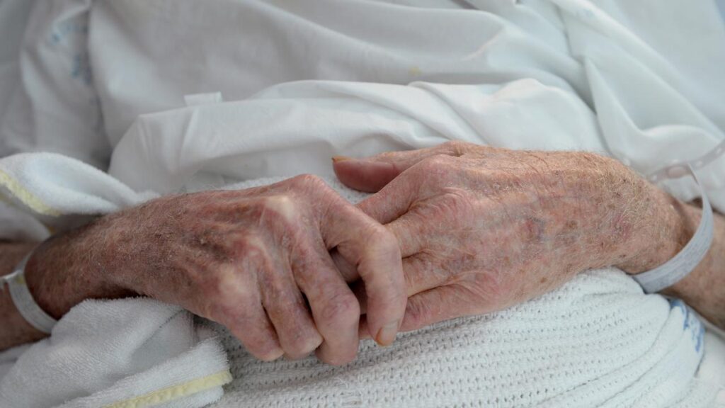 Criticism grows over a bill that only people with a year or less to live could use assisted dying.
