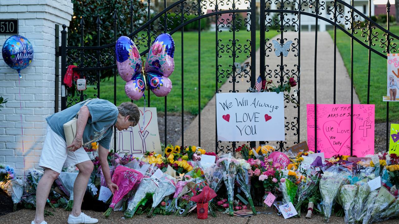 Flowers at a memorial outside Dolly Parton's home in Tennessee