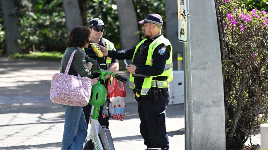 Police are performing breath tests on e-scooter riders as part of new enforcements in Queensland. 
