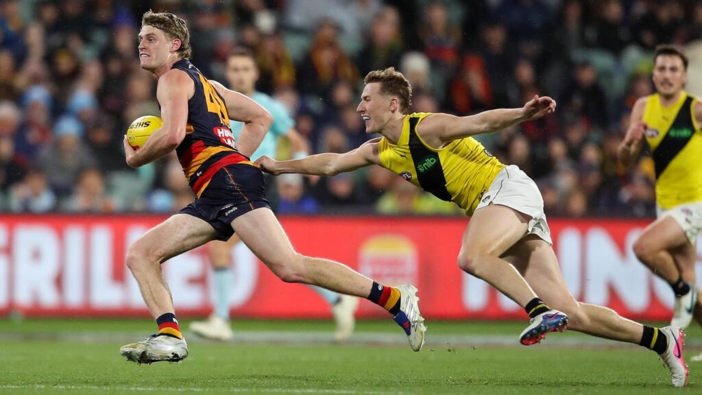 Hugo Hall-Kahan evades Hugo Ralphsmith during the Crows’ nine-point victory over Richmond.
