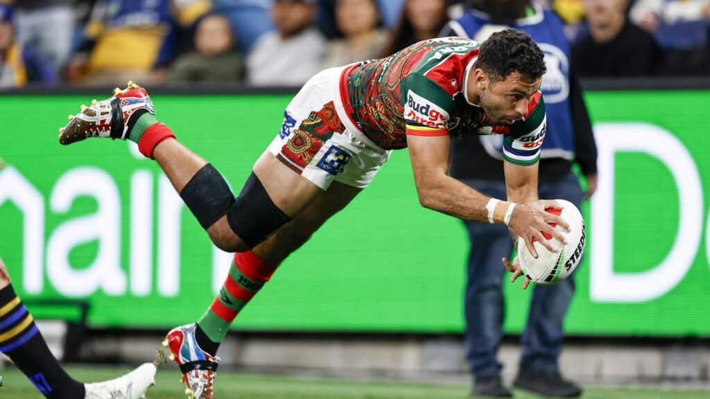 Souths winger Alex Johnston has scored three tries in a thrilling Rabbitohs win over Parramatta.
