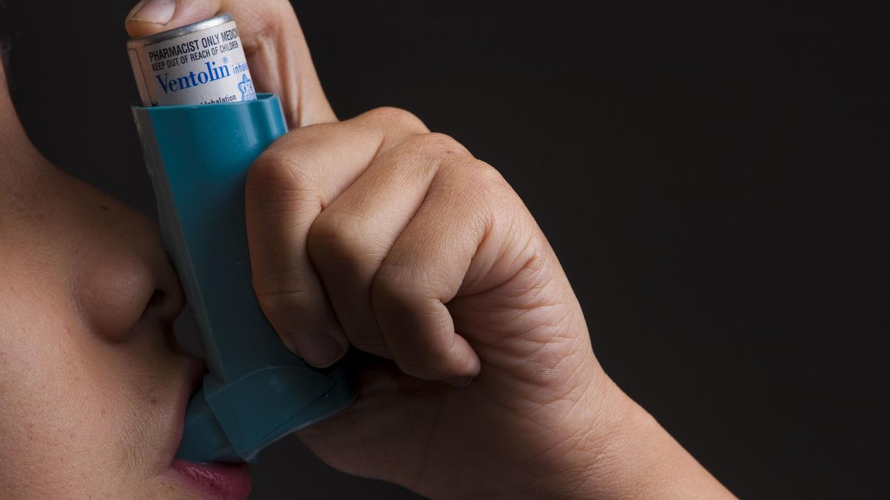 A asthma inhaler is pictured in use, Brisbane