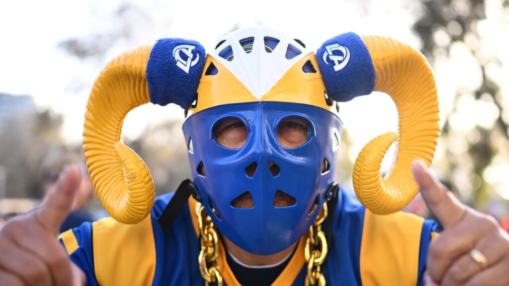 Fans were decked out to support their teams at the NFL game between the Rams and 49ers at the MCG.
