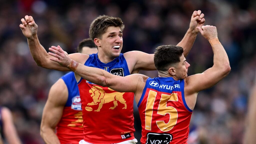 “Bit of a fluke”: Zac Bailey (l) relished his late goal in Brisbane’s thrilling grand final win.
