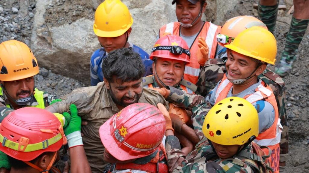 The Nepali army rescued two workers trapped for nine days inside a tunnel at a hydropower project.
