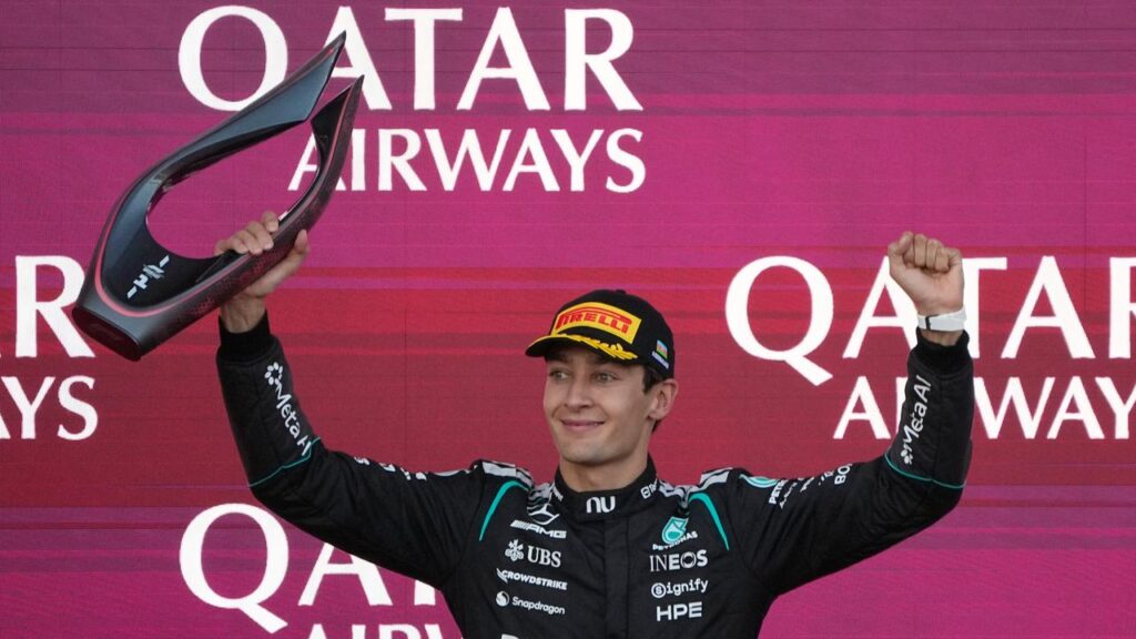 George Russell celebrates after winning a dramatic Azerbaijan Grand Prix in Baku.
