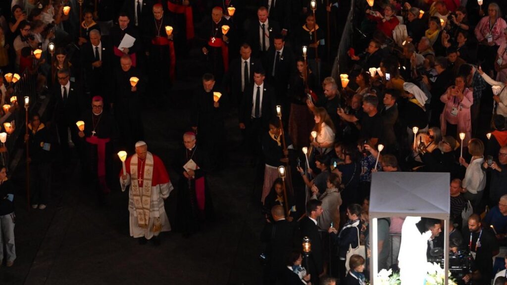 The Pope led a candlelight procession at Lourdes, a Catholic place of pilgrimage.
