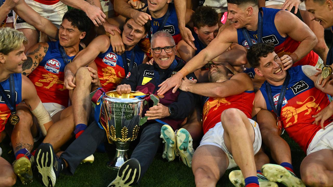 Chris Fagan joined the players to soak up another premiership.