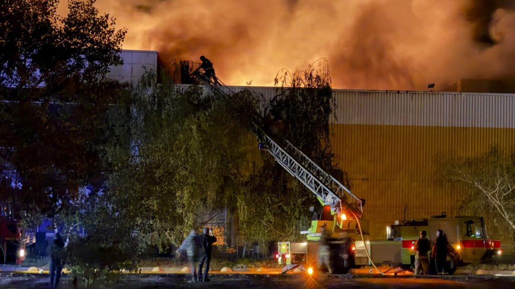 Rescuers work at the site of a Russian strike on a shopping centre in Zaporizhzhia, Ukraine.
