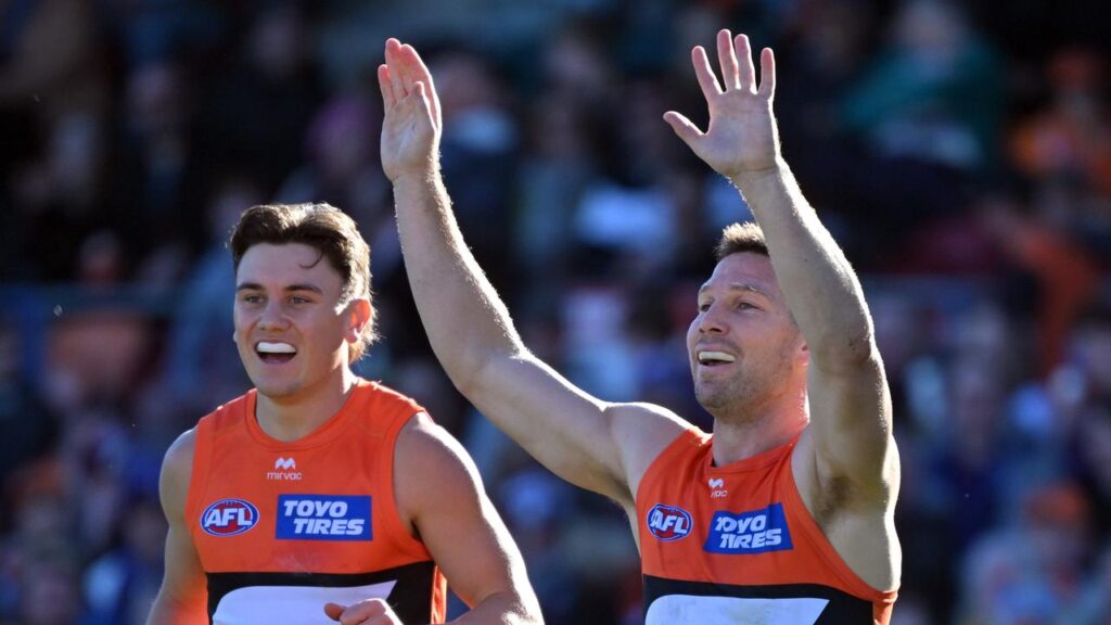 Giants great Toby Greene (right) is mulling his future, with a move to Geelong on the table.
