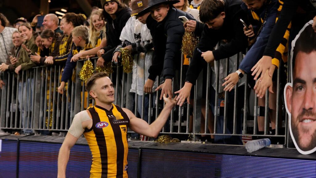 Harry Morrison celebrates with Hawthorn fans after their qualifying-final win over Fremantle.

