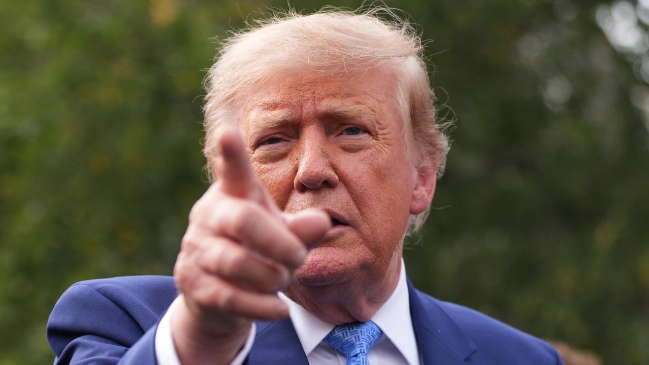 US President Donald Trump speaks to reporters