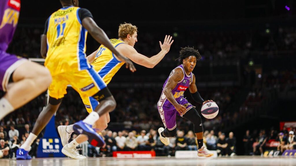 Kendric Davis has led Sydney to a win over Brisbane that keeps them unbeaten in the NBL season.
