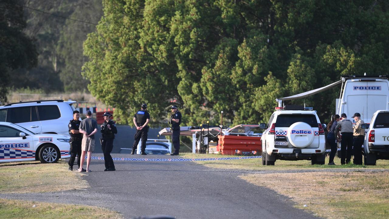 Investigators at the scene where a plane has crashed