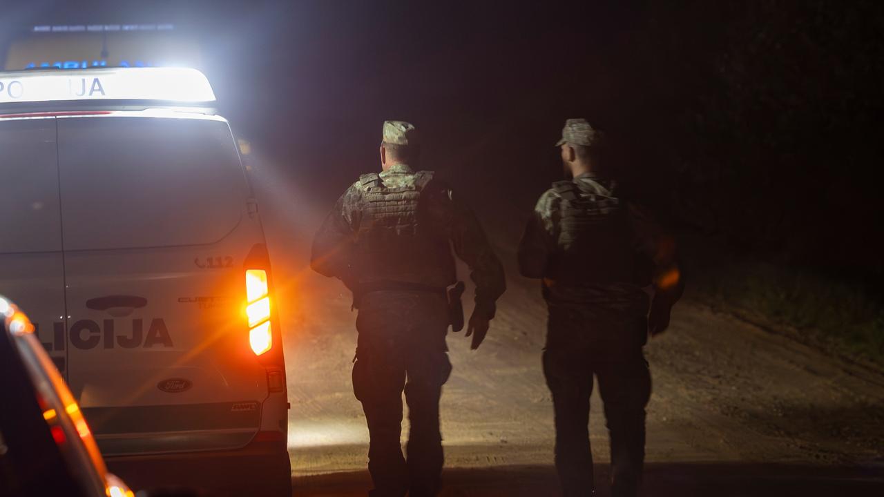 Lithuanian soldiers are securing the area where a drone was shot down